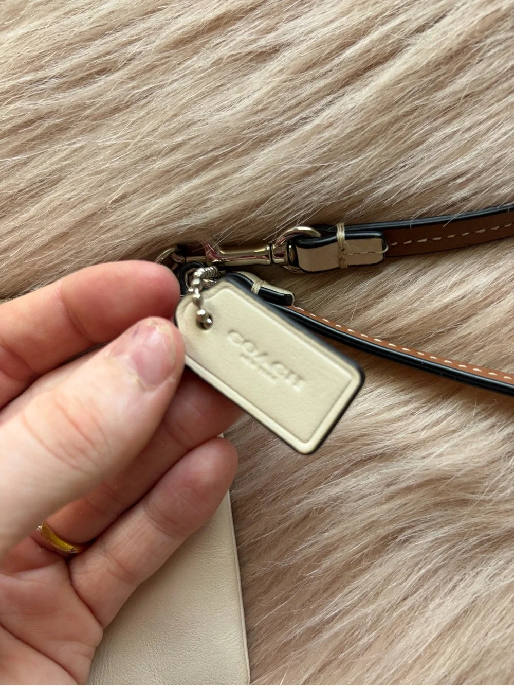 Coach Cream Leather Wristlet with Brown Trim and Silver Hardware